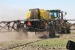 John Deere 8335 R mit TopAir TA 2400 Spritze.JPG