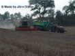Lexion 480 und Case MX 270 mit tridem Hawe Überladewagen