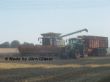 Lexion 600 lädt auf Fendt 930 mit tridem Krampe ab