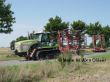 Claas Challenger 95E mit 8m Horschgrubber und Gummiwalze